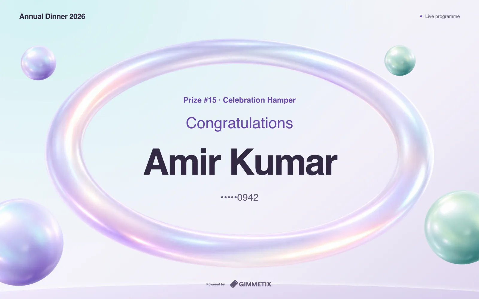 LED display revealing a winner’s name inside an iridescent pearl ring for Prize #15 at the Annual Dinner 2026